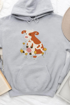 Cartoon Cow Sitting In The Grass Hoodie